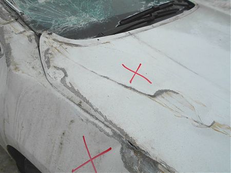 Поврежденные капот и крыло Opel Astra